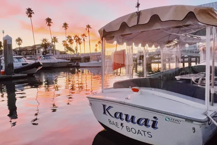a boat parked next to a body of water